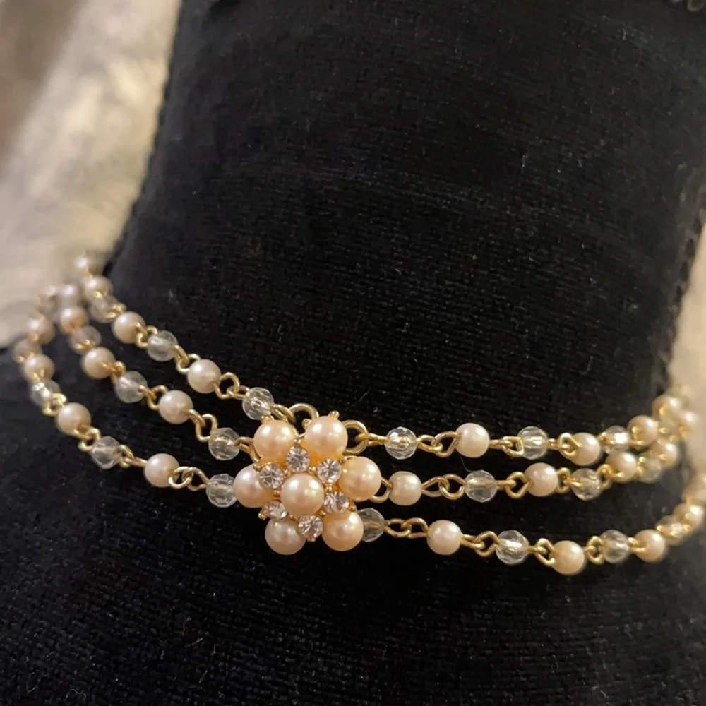 Delicate multi chain gold and pearl choker necklace